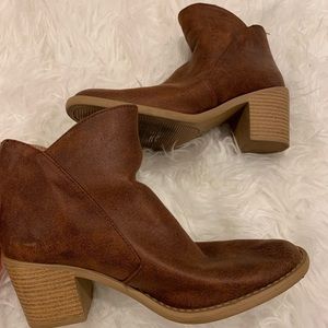 Closed toe, chunky heel booties.